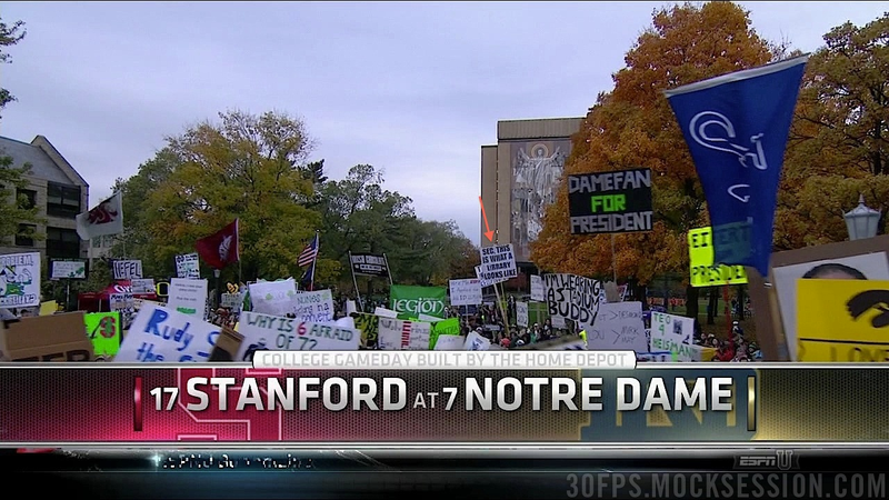 Illustration for article titled Eifert Tower! Your Roundup Of The Best Signs Behind The College Gameday Crew, Plus Lee Corso Dressed As A Leprechaun